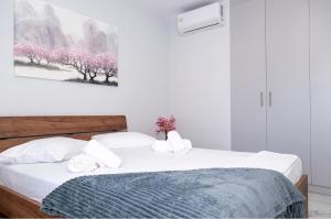 Rhea Central Luxury Apartment