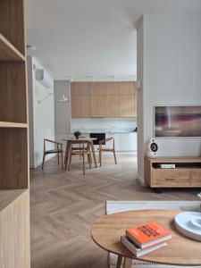 Nowoczesny apartament z tarasem w cichej dzielnicy willowej blisko centrum
