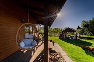 Holiday home with sauna, jacuzzi and private pond