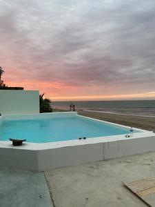 Architect-designed house with pool, beach front