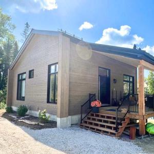 Modern Cottage on Blue Sea Lake on Cycling Route