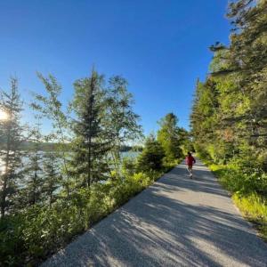 Modern Cottage on Blue Sea Lake on Cycling Route