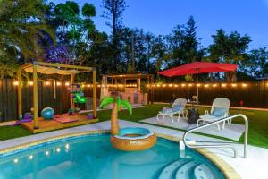 Heated Pool & Spa • Outdoor Kitchen/Theater/Games