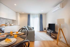 Porto Living | 1BR Flat with AC