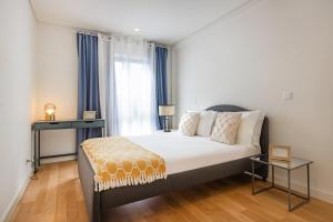 Porto Living | 1BR Flat with AC