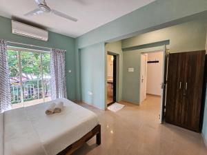 Serene 2BHK Porvorim Apartment with Forest View & Pool Access