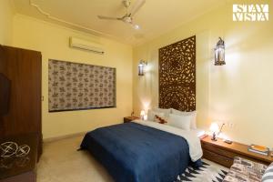 StayVista at House of Palm with Bonfire & Pool