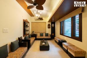 StayVista at House of Palm with Bonfire & Pool
