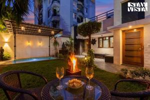 StayVista at House of Palm with Bonfire & Pool