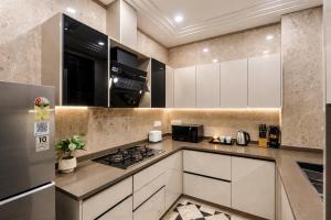 The GK Prime by The Blue Kite, Fully Serviced Luxury Apartments near GK-1 M Block Market & Cafés