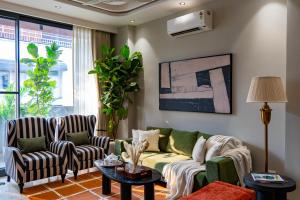 The GK Prime by The Blue Kite, Fully Serviced Luxury Apartments near GK-1 M Block Market & Cafés