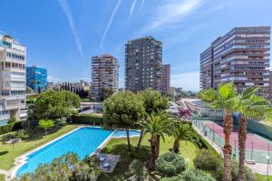 Bahía San Juan apartamento - Playa y piscina AC a partir de julio