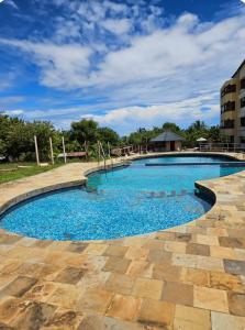 Hewani a bright & airy 1 BR apartment with an ocean view & pool