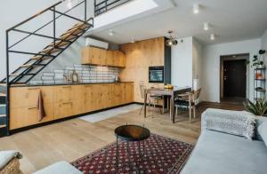 Rooftop Boho Loft by Tyzenhauz