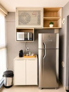 Studio na Av Esmeraldas com garagem