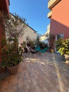 Trilocale Moderno con Terrazzo e Parcheggio