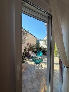 Trilocale Moderno con Terrazzo e Parcheggio