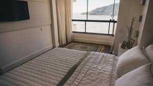 Lindo Apartamento Pé na areia em Balneario Camboriu