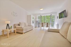 Sunset Apartments - duży i słoneczny balkon - parking - 400m od plaży - zielona okolica