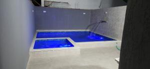 Casa com piscina, hidromassagem e área gourmet completa