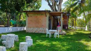 Cabaña en Necoclí BBQ Jardín Playa 5 min con AC 560 m2