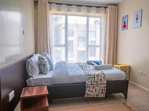Easy Stay Rongai Poolside 2BR near Karen WiFi and Netflix
