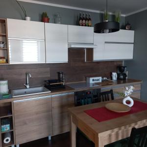 Apartament pod dębami
