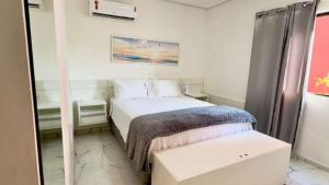 Flat próximo da praia em, 3 Suítes até 8 Pessoas