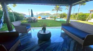 Casa Pé na Areia Ferradura, 5 Suítes