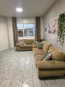 Casa no Centro de Imbé com Estacionamento e Pátio