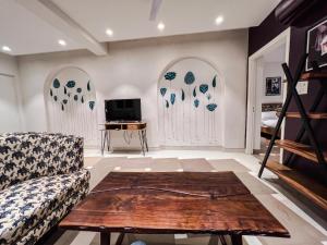 One Uptown 203 modern 1 BHK loft