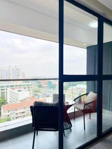 The comfort executive loft three bedroom apartment with amazing breathtaking city views , swimming pool ,gym ,private ample parking space with designated child playground area