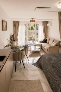 Maluno vilos apartamentas su terasa