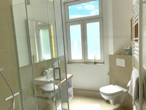 Villa Johanna App 2 - maritimes Wohnen in bester Lage mit Südbalkon & Garten