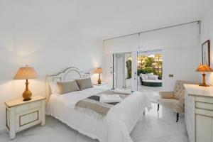 Luxury Beachfront Apt with Private Garden & Pool
