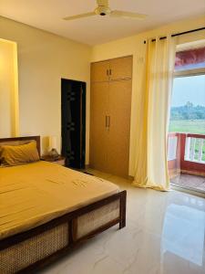 Lush feld view 2bhk apartment in quiet south Goa