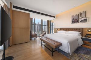 広州 포 포인츠 바이 쉐라톤 광저우 창룽 완보 비즈니스 디스트릭트 (Four Points by Sheraton Guangzhou Changlong Wanbo Business District) ホテル スイート