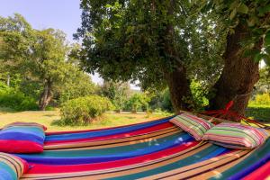la villa rossa nestled between the hills and the sea