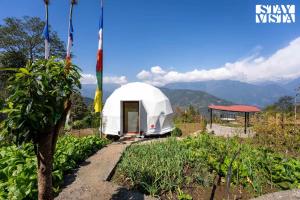 StayVista at The Stargazer with Mountain Views, Bonfire, Lawn