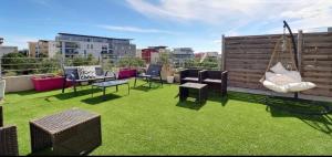 Duplex 120m ,50m terrasse proche centre et mer