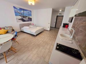 Family Studio - Beach Pool & Spa Resort prima linie