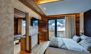 Hotels Hotel-Chalet Les Ecureuils Jardin, Piscine, Sauna : photos des chambres