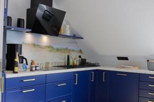 Inselblume 34 - Ferienwohnung mit Loggia