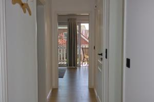 Inselblume 34 - Ferienwohnung mit Loggia