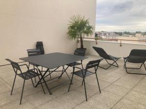 Studio centre ville avec grande terrasse vue unique