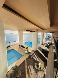 Akoya Sky Living de Lujo frente Playa y Malecón