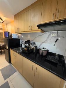 Cozy 1 Bedroom with Balcony near SM North EDSA