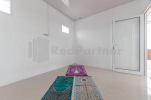 Adam Guesthouse Mitra RedDoorz
