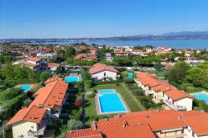 Harmony Apartment - Terrazza e piscina a pochi passi dal lago