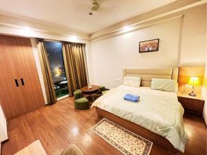 Room Theory - Expo India Center